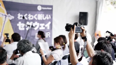 Journalists filming at the Segway launch event in Japan